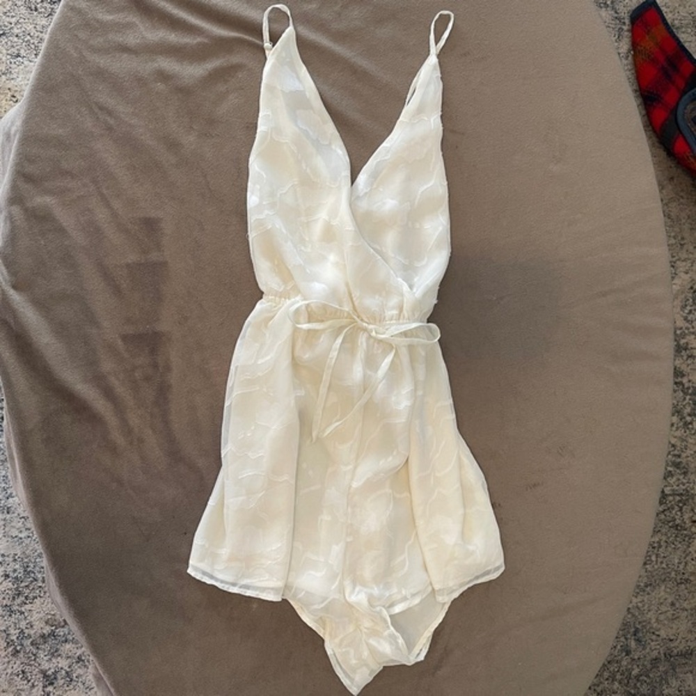 Hope’s Ivory Satin-Look Surplice Romper